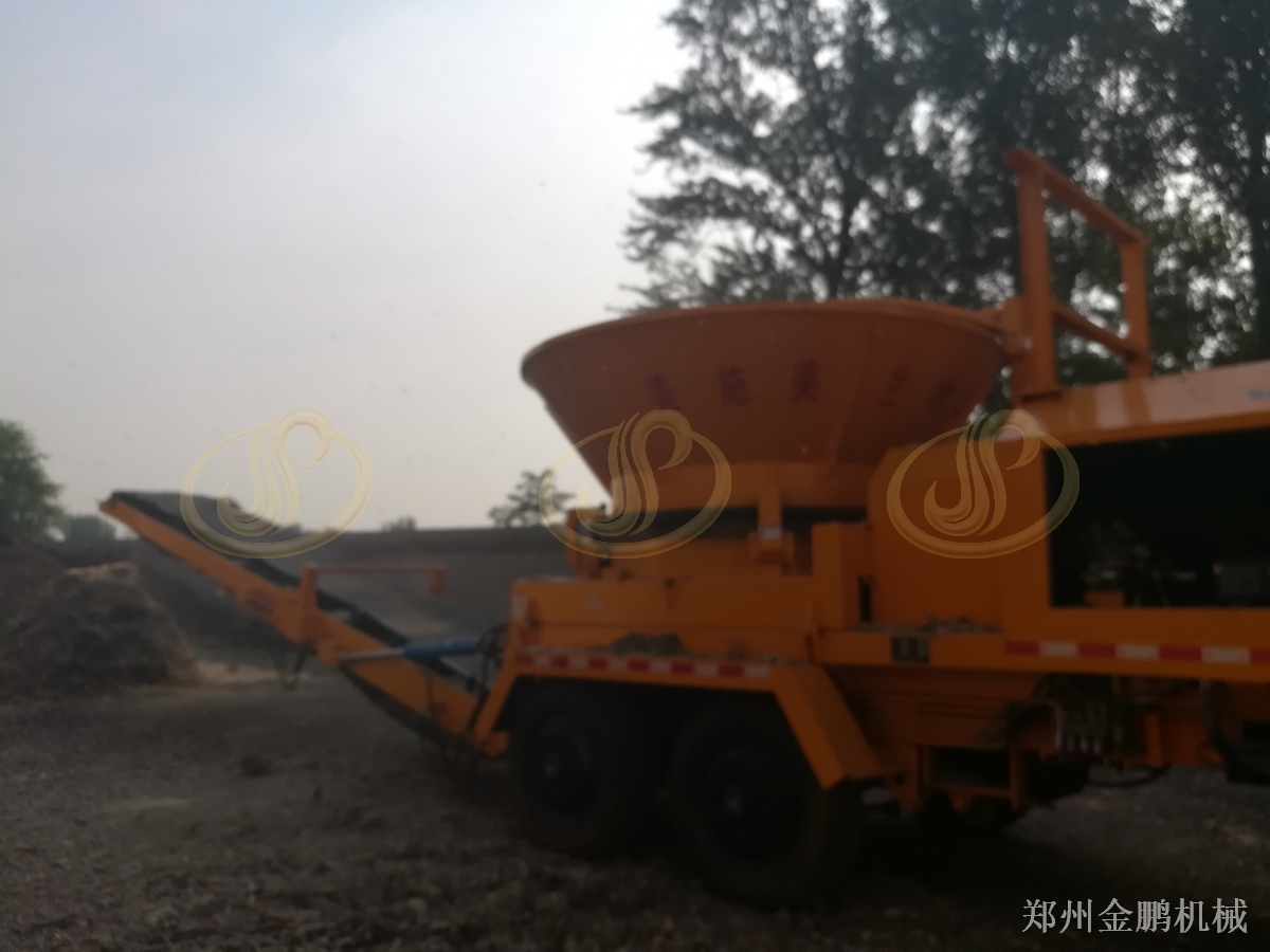 郑州金鹏树根破碎机设备用于大尺寸硬质木料预粉碎